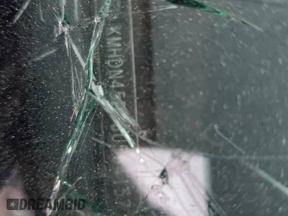 2003 Hyundai Elantra GLS z VIN KMHDN45D33U564157, wystawiony jako Copart lot #81056364 z przebiegiem Nie podano mil oraz Szkoda całkowita • Salvage title. Historia ofert i sprzedaży dostępna na DreamBid. Obrazek 12.