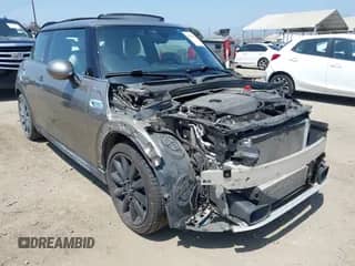 2017 MINI Hardtop Cooper S with VIN WMWXP7C34H2C61768, listed as a IAAI auction lot 42579522 with 67,876 mi miles and . Bid and sale history available at DreamBid. Image 1.