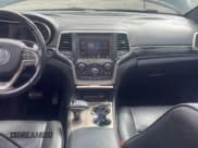 ✅ 2014 Jeep Grand Cherokee Overland • VIN: 1C4RJFCG7EC181541 • Lot: 71310765. Listed on Copart with 226,757 mi. Free auction sales archive from the USA and detailed vehicle history report at DreamBid. Image 9.