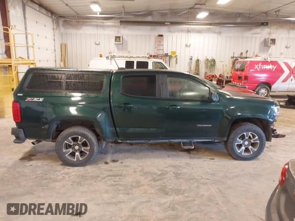 2015 Chevrolet Colorado 4WD Z71 z VIN 1GCGTCE33F1173802, wystawiony jako IAAI lot #43414823 z przebiegiem 177 350 mil mil oraz . Historia ofert i sprzedaży dostępna na DreamBid. Obrazek 13.
