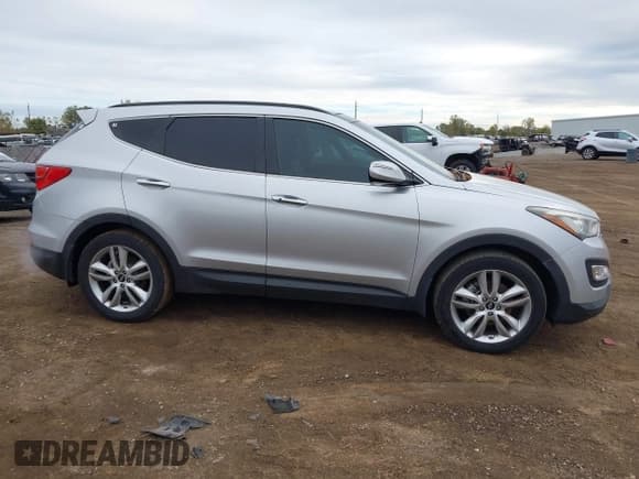 ✅ 2016 Hyundai Santa Fe • VIN: 5XYZWDLA9GG309133 • Lot: 43429006. Listed on IAAI with 125,931 mi. Free auction sales archive from the USA and detailed vehicle history report at DreamBid. Image 13.