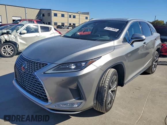 ✅ 2022 Lexus RX 350 • VIN: 2T2HZMDAXNC324133 • Lot: 91471065. Listed on Copart with 74,518 mi. Free auction sales archive from the USA and detailed vehicle history report at DreamBid. Image 1.