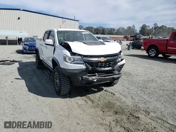 ✅ 2018 Chevrolet Colorado 4WD ZR2 • VIN: 1GCGTEEN8J1147993 • Lot: 89459035. Listed on Copart with 127,549 mi. Free auction sales archive from the USA and detailed vehicle history report at DreamBid. Image 13.
