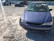 ✅ 1999 Toyota Corolla CE • VIN: 2T1BR12E9XC127455 • Lot: 81953255. Listed on Copart with 184,427 mi. Free auction sales archive from the USA and detailed vehicle history report at DreamBid. Image 13.