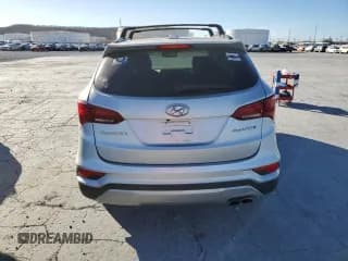 ✅ 2017 Hyundai Santa Fe Ultimate • VIN: 5XYZWDLA8HG435033 • Лот: 36874913. Опубликован ранее на Copart с пробегом 57 214 миль. Бесплатный доступ к архиву аукционных продаж из США и подробный отчёт об истории автомобиля на DreamBid. Изображение 6.