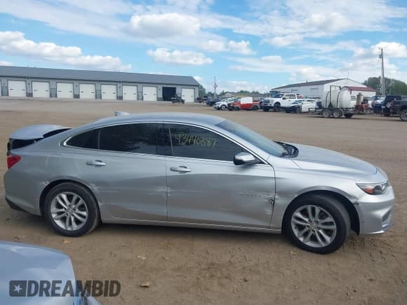 ✅ 2017 Chevrolet Malibu LT • VIN: 1G1ZE5ST3HF205245 • Lot: 43440387. Listed on IAAI with 143,471 mi. Free auction sales archive from the USA and detailed vehicle history report at DreamBid. Image 14.