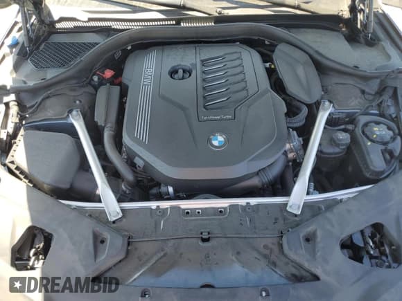 ✅ 2024 BMW 8 Series 840i • VIN: WBAGV2C08RCP97713 • Лот: 57355405. Опубликован ранее на Copart с пробегом 14 802 миль. Бесплатный доступ к архиву аукционных продаж из США и подробный отчёт об истории автомобиля на DreamBid. Изображение 11.