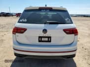 ✅ 2024 Volkswagen Tiguan SE R-Line Black • VIN: 3VVCB7AX4RM149406 • Lot: 70992035. Wystawiony na Copart z przebiegiem 24 458 mil. Bezpłatny archiwum sprzedaży aukcyjnych z USA i szczegółowy raport historii pojazdu na DreamBid. Zdjęcie 6.