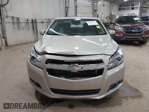 ✅ 2013 Chevrolet Malibu LTZ • VIN: 1G11H5SA5DF179700 • Lot: 43591171. Listed on IAAI with 148,979 mi. Free auction sales archive from the USA and detailed vehicle history report at DreamBid. Image 11.