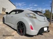 ✅ 2013 Hyundai Veloster w/Gray Int • VIN: KMHTC6AD5DU129192 • Lot: 76520404. Wystawiony na Copart z przebiegiem 108 688 mil. Bezpłatny archiwum sprzedaży aukcyjnych z USA i szczegółowy raport historii pojazdu na DreamBid. Zdjęcie 3.