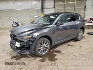 ✅ 2019 Mazda CX-5 Grand Touring • VIN: JM3KFBDM8K0658126 • Lot: 93370365. Listed on Copart with 59,904 mi. Free auction sales archive from the USA and detailed vehicle history report at DreamBid. Image 1.