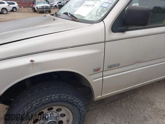 ✅ 1994 Isuzu Rodeo LS • VIN: 4S2CY58V9R4321032 • Lot: 41546575. Wystawiony na IAAI z przebiegiem 287 035 mil. Bezpłatny archiwum sprzedaży aukcyjnych z USA i szczegółowy raport historii pojazdu na DreamBid. Zdjęcie 12.