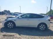 ✅ 2021 Tesla Model Y Standard Range • VIN: 5YJYGDED4MF192824 • Lot: 42128810. Listed on IAAI with 52,268 mi. Free auction sales archive from the USA and detailed vehicle history report at DreamBid. Image 14.