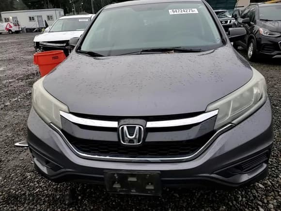 ✅ 2015 Honda CR-V LX • VIN: 2HKRM4H36FH617576 • Lot: 94724275. Listed on Copart with 92,775 mi. Free auction sales archive from the USA and detailed vehicle history report at DreamBid. Image 14.