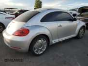 ✅ 2013 Volkswagen Beetle 2.5L • VIN: 3VWJP7AT0DM604486 • Lot: 92515115. Wystawiony na Copart z przebiegiem 140 041 mil. Bezpłatny archiwum sprzedaży aukcyjnych z USA i szczegółowy raport historii pojazdu na DreamBid. Zdjęcie 3.