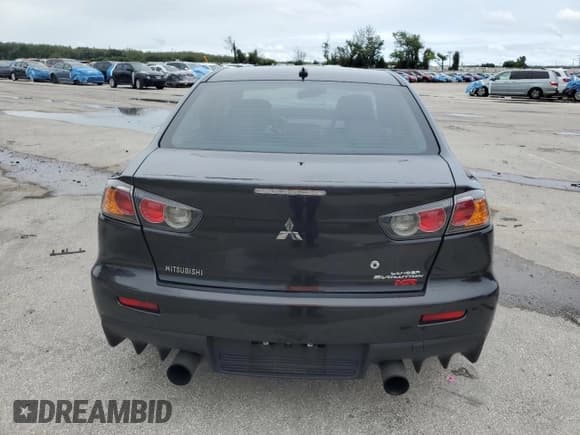 ✅ 2012 Mitsubishi Lancer Evolution MR • VIN: JA32W5FV2CU031365 • Lot: 74764024. Wystawiony na Copart z przebiegiem 127 813 mil. Bezpłatny archiwum sprzedaży aukcyjnych z USA i szczegółowy raport historii pojazdu na DreamBid. Zdjęcie 6.
