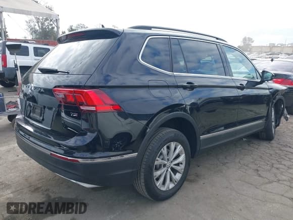 ✅ 2018 Volkswagen Tiguan SEL • VIN: 3VV3B7AX8JM094771 • Лот: 43419406. Опубликован ранее на IAAI с пробегом 54 219 миль. Бесплатный доступ к архиву аукционных продаж из США и подробный отчёт об истории автомобиля на DreamBid. Изображение 4.
