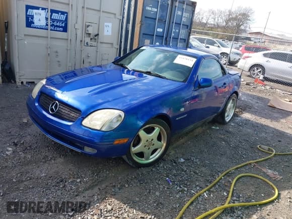 ✅ 2000 Mercedes-Benz SLK 230 Kompressor • VIN: WDBKK47F5YF145935 • Лот: 43478134. Опубликован ранее на IAAI с пробегом Не указан. Бесплатный доступ к архиву аукционных продаж из США и подробный отчёт об истории автомобиля на DreamBid. Изображение 2.