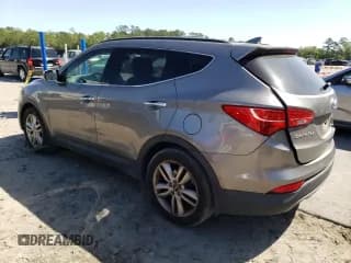 ✅ 2015 Hyundai Santa Fe • VIN: 5XYZWDLAXFG260605 • Лот: 49075103. Опубликован ранее на Copart с пробегом 107 150 миль. Бесплатный доступ к архиву аукционных продаж из США и подробный отчёт об истории автомобиля на DreamBid. Изображение 2.