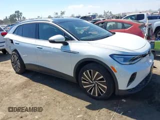 ✅ 2023 Volkswagen ID.4 Pro S Plus • VIN: 1V2HMPE86PC057938 • Lot: 43357958. Wystawiony na IAAI z przebiegiem 18 060 mil. Bezpłatny archiwum sprzedaży aukcyjnych z USA i szczegółowy raport historii pojazdu na DreamBid. Zdjęcie 1.