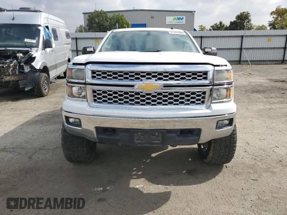2014 Chevrolet Silverado 1500 LT с VIN 3GCUKRECXEG261755, выставлен на аукционе Copart как лот 87444585 с пробегом 119 580 миль миль и Списание • Salvage title. История ставок и продаж доступна на DreamBid. Изображение 5.