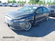 ✅ 2017 Ford Fusion Hybrid S • VIN: 3FA6P0UU9HR132906 • Lot: 42651675. Listed on IAAI with 96,616 mi. Free auction sales archive from the USA and detailed vehicle history report at DreamBid. Image 17.