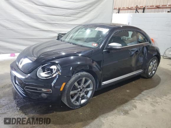 ✅ 2014 Volkswagen Beetle 2.0L TDI w/Sun/Sound/Nav • VIN: 3VWJL7AT0EM656309 • Лот: 68018735. Опубликован ранее на Copart с пробегом 117 222 миль. Бесплатный доступ к архиву аукционных продаж из США и подробный отчёт об истории автомобиля на DreamBid. Изображение 1.