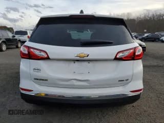 ✅ 2018 Chevrolet Equinox LT • VIN: 2GNAXSEV6J6256059 • Lot: 91813995. Wystawiony na Copart z przebiegiem 96 132 mil. Bezpłatny archiwum sprzedaży aukcyjnych z USA i szczegółowy raport historii pojazdu na DreamBid. Zdjęcie 6.