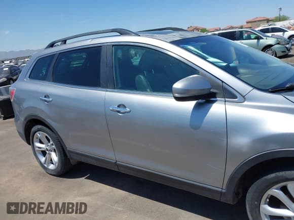 ✅ 2011 Mazda CX-9 Grand Touring • VIN: JM3TB2DA6B0327549 • Лот: 42910094. Опубликован ранее на IAAI с пробегом 233 874 миль. Бесплатный доступ к архиву аукционных продаж из США и подробный отчёт об истории автомобиля на DreamBid. Изображение 13.