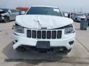 ✅ 2015 Jeep Grand Cherokee Laredo • VIN: 1C4RJEAG7FC104893 • Lot: 43009030. Listed on IAAI with 128,500 mi. Free auction sales archive from the USA and detailed vehicle history report at DreamBid. Image 13.
