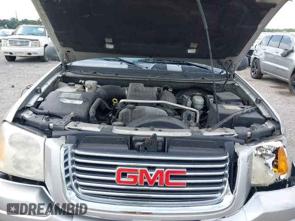 ✅ 2006 GMC Envoy SLE • VIN: 1GKDT13S762116213 • Lot: 42770038. Listed on IAAI with 231,915 mi. Free auction sales archive from the USA and detailed vehicle history report at DreamBid. Image 10.