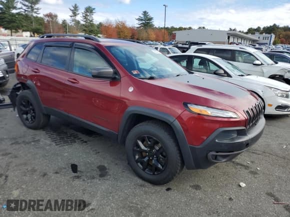 ✅ 2015 Jeep Cherokee Trailhawk • VIN: 1C4PJMBS7FW785740 • Lot: 89643045. Listed on Copart with 199,831 mi. Free auction sales archive from the USA and detailed vehicle history report at DreamBid. Image 4.