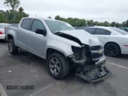 ✅ 2018 Chevrolet Colorado 4WD Z71 • VIN: 1GCGTDEN1J1139485 • Лот: 40330792. Опубликован ранее на IAAI с пробегом 107 078 миль. Бесплатный доступ к архиву аукционных продаж из США и подробный отчёт об истории автомобиля на DreamBid. Изображение 1.