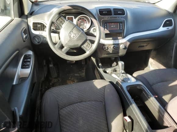 2013 Dodge Journey American Value with VIN 3C4PDCAB5DT597224, listed as a Copart auction lot 82536665 with 104,666 mi miles and Clean title. Bid and sale history available at DreamBid. Image 8.