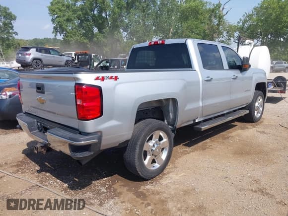 ✅ 2018 Chevrolet Silverado 2500HD Work Truck • VIN: 1GC1KUEG0JF185015 • Lot: 42571720. Listed on IAAI with 185,083 mi. Free auction sales archive from the USA and detailed vehicle history report at DreamBid. Image 4.