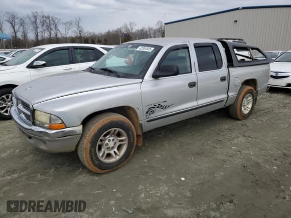 ✅ 2001 Dodge Dakota Sport • VIN: 1B7HL2AN71S275967 • Lot: 42954505. Wystawiony na Copart z przebiegiem 168 681 mil. Bezpłatny archiwum sprzedaży aukcyjnych z USA i szczegółowy raport historii pojazdu na DreamBid. Zdjęcie 1.