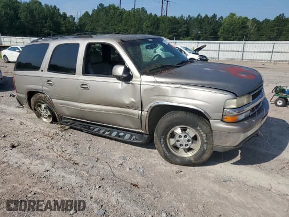 ✅ 2001 Chevrolet Tahoe LS • VIN: 1GNEK13T21J220917 • Lot: 62087995. Listed on Copart with 200,325 mi. Free auction sales archive from the USA and detailed vehicle history report at DreamBid. Image 4.