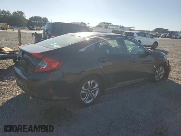 ✅ 2018 Honda Civic LX • VIN: 19XFC2F57JE024174 • Lot: 82555745. Listed on Copart with 121,638 mi. Free auction sales archive from the USA and detailed vehicle history report at DreamBid. Image 3.