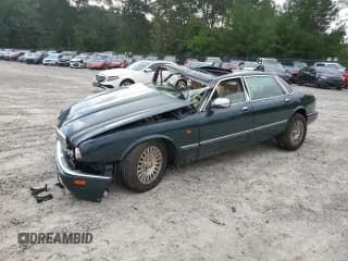 ✅ 1996 Jaguar XJ Vanden Plas • VIN: SAJKX6245TC782985 • Лот: 73538834. Опубликован ранее на Copart с пробегом Не указан. Бесплатный доступ к архиву аукционных продаж из США и подробный отчёт об истории автомобиля на DreamBid. Изображение 1.