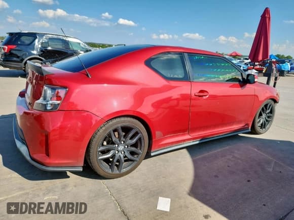 ✅ 2016 Scion tC • VIN: JTKJF5C71GJ025804 • Лот: 71232905. Опубликован ранее на Copart с пробегом 151 350 миль. Бесплатный доступ к архиву аукционных продаж из США и подробный отчёт об истории автомобиля на DreamBid. Изображение 3.