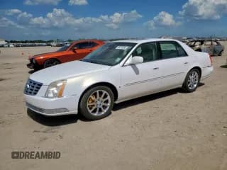 ✅ 2006 Cadillac DTS 1SE • VIN: 1G6KD57926U253856 • Lot: 66212055. Listed on Copart with 146,721 mi. Free auction sales archive from the USA and detailed vehicle history report at DreamBid. Image 1.