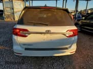 ✅ 2019 Honda Odyssey EX-L • VIN: 5FNRL6H76KB094876 • Лот: 94815715. Опубликован ранее на Copart с пробегом 131 476 миль. Бесплатный доступ к архиву аукционных продаж из США и подробный отчёт об истории автомобиля на DreamBid. Изображение 6.