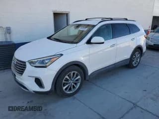 ✅ 2017 Hyundai Santa Fe SE • VIN: KM8SMDHF0HU232112 • Lot: 90606685. Wystawiony na Copart z przebiegiem 143 686 mil. Bezpłatny archiwum sprzedaży aukcyjnych z USA i szczegółowy raport historii pojazdu na DreamBid. Zdjęcie 1.