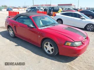 ✅ 2003 Ford Mustang Deluxe • VIN: 1FAFP444X3F446335 • Lot: 43264877. Listed on IAAI with 121,012 mi. Free auction sales archive from the USA and detailed vehicle history report at DreamBid. Image 1.