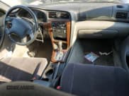 ✅ 2003 Subaru Legacy L • VIN: 4S3BH635337307251 • Lot: 69490574. Listed on Copart with 127,548 mi. Free auction sales archive from the USA and detailed vehicle history report at DreamBid. Image 8.