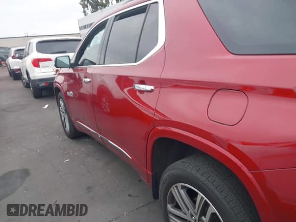 ✅ 2023 Chevrolet Traverse High Country • VIN: 1GNEVNKW9PJ242335 • Lot: 42415467. Wystawiony na IAAI z przebiegiem 25 855 mil. Bezpłatny archiwum sprzedaży aukcyjnych z USA i szczegółowy raport historii pojazdu na DreamBid. Zdjęcie 14.