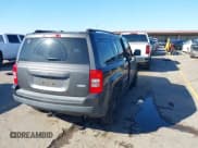 ✅ 2015 Jeep Patriot Latitude • VIN: 1C4NJPFB1FD191059 • Lot: 43598154. Listed on IAAI with 92,071 mi. Free auction sales archive from the USA and detailed vehicle history report at DreamBid. Image 4.