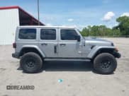 ✅ 2021 Jeep Wrangler Unlimited Sahara • VIN: 1C4HJXEN9MW637288 • Lot: 42553459. Listed on IAAI with 39,362 mi. Free auction sales archive from the USA and detailed vehicle history report at DreamBid. Image 13.