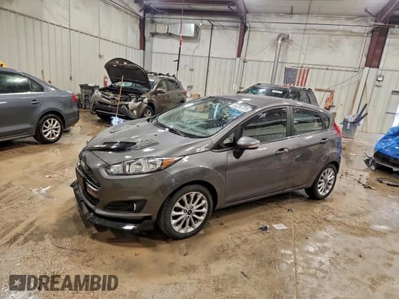 ✅ 2014 Ford Fiesta SE • VIN: 3FADP4EJ0EM186218 • Lot: 94361555. Wystawiony na Copart z przebiegiem 18 703 mil. Bezpłatny archiwum sprzedaży aukcyjnych z USA i szczegółowy raport historii pojazdu na DreamBid. Zdjęcie 1.