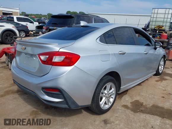 2017 Chevrolet Cruze LT with VIN 1G1BE5SM1H7257414, listed as a IAAI auction lot 43180998 with 103,728 mi miles and . Bid and sale history available at DreamBid. Image 4.